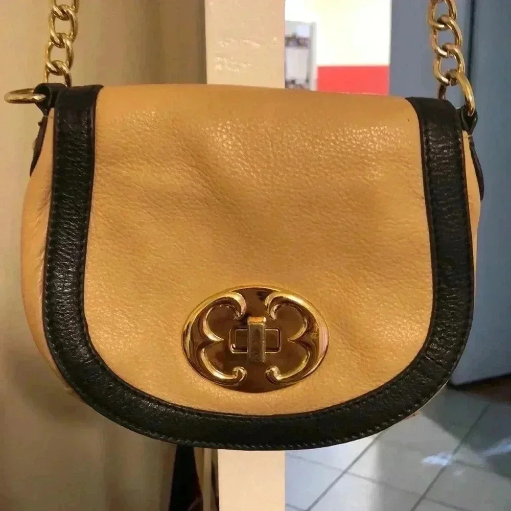 Emma Fox two-toned saddle crossbody bag.